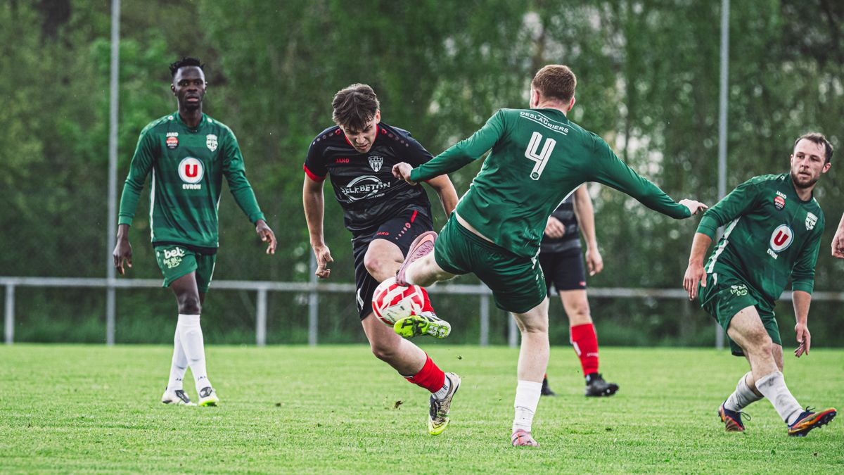 Vibrant action shot of a football match in France, capturing players in motion on the field.