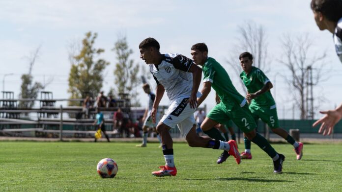 Action-packed soccer game with players in green and white on grassy field. Action-packed soccer game with players in green and white on grassy field.